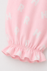Girl wearing Anaario Pink Alphabet Night Suit