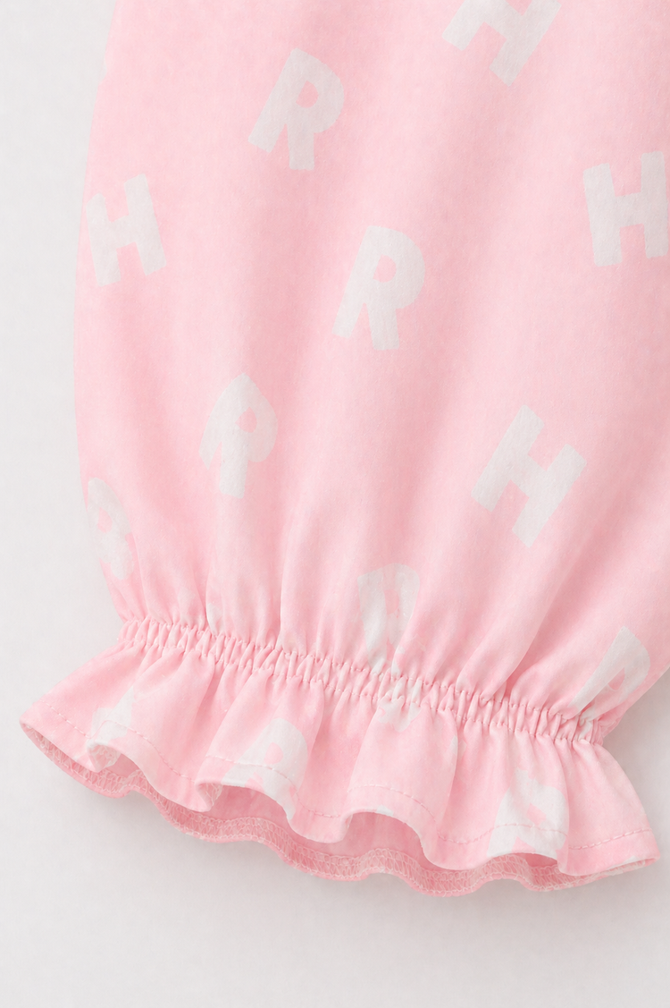 Girl wearing Anaario Pink Alphabet Night Suit