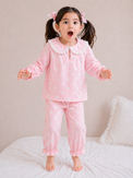 Girl wearing Anaario Pink Alphabet Night Suit
