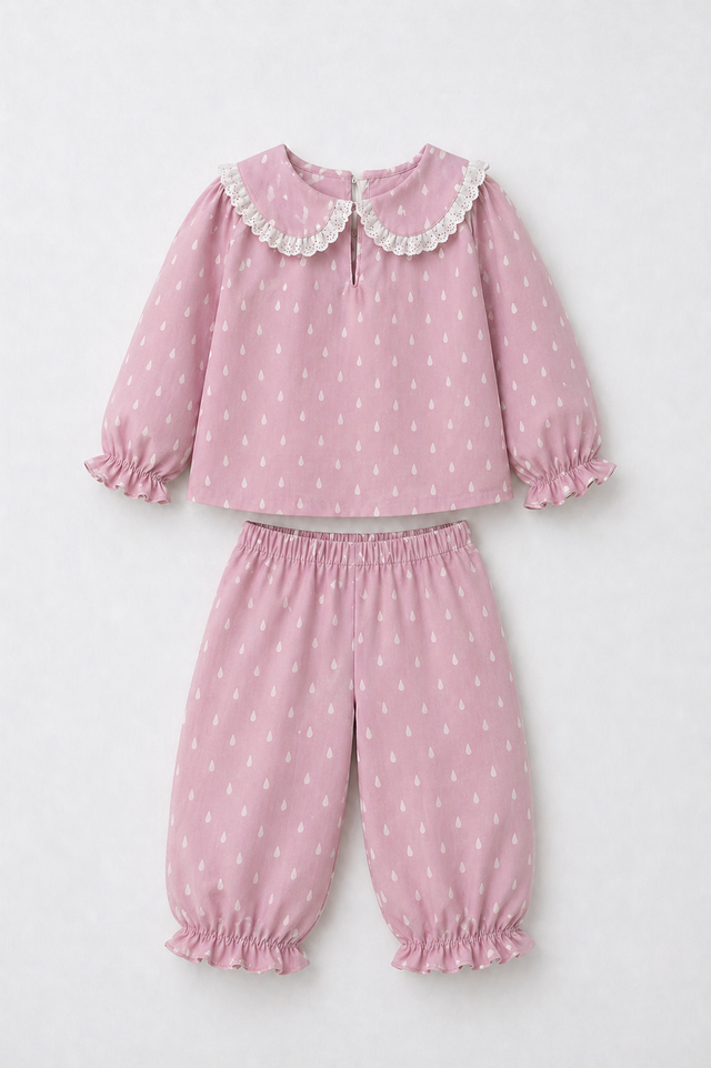 Girl wearing Anaario Pink and White Raindrops Night Suit