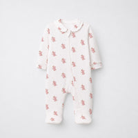 Pink Dino bamboo cotton baby sleepsuit — full-sleeve two-way zip romper onesie, front