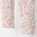 Pink Floral bamboo cotton baby sleepsuit — bamboo cotton onesie romper flatlay