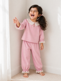 Girl wearing Anaario Pink Whispers Night Suit