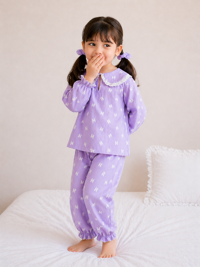 Girl wearing Anaario Purple Alphabet Night Suit