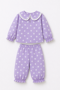 Girl wearing Anaario Purple Alphabet Night Suit