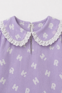 Girl wearing Anaario Purple Alphabet Night Suit