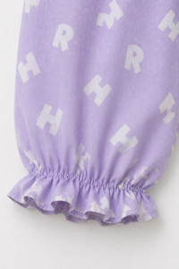 Girl wearing Anaario Purple Alphabet Night Suit