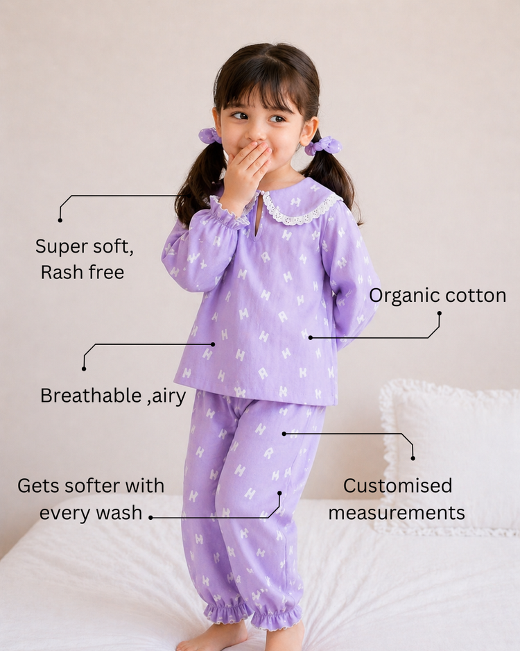 Girl wearing Anaario Purple Alphabet Night Suit