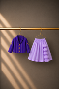 Anaario Purple Bird Jacket-Lehenga Set, purple jacket and lilac lehenga on hangers