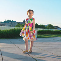 Girl wearing Anaario Rainbow Prism Dress