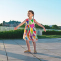 Girl wearing Anaario Rainbow Prism Dress