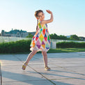 Girl wearing Anaario Rainbow Prism Dress