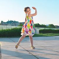 Girl wearing Anaario Rainbow Prism Dress