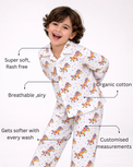 Boy wearing Anaario Rainbow Zebra Night Suit