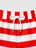 Boy wearing Anaario Red Stripe Shirt, red and white striped shirt, shown styled with matching shorts