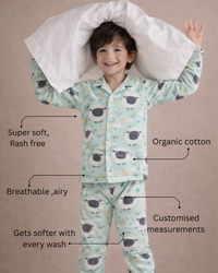 Boy wearing Anaario Sheep and Night Sky Night Suit