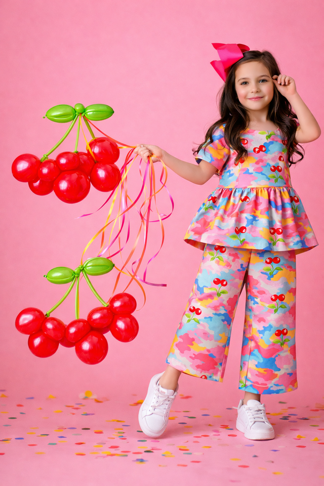 Girl wearing Anaario Splashes and Cherry Co-ord Set