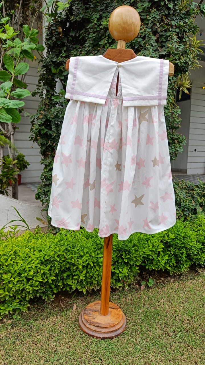 Girl wearing Anaario Starlight Bows Sailor Dress