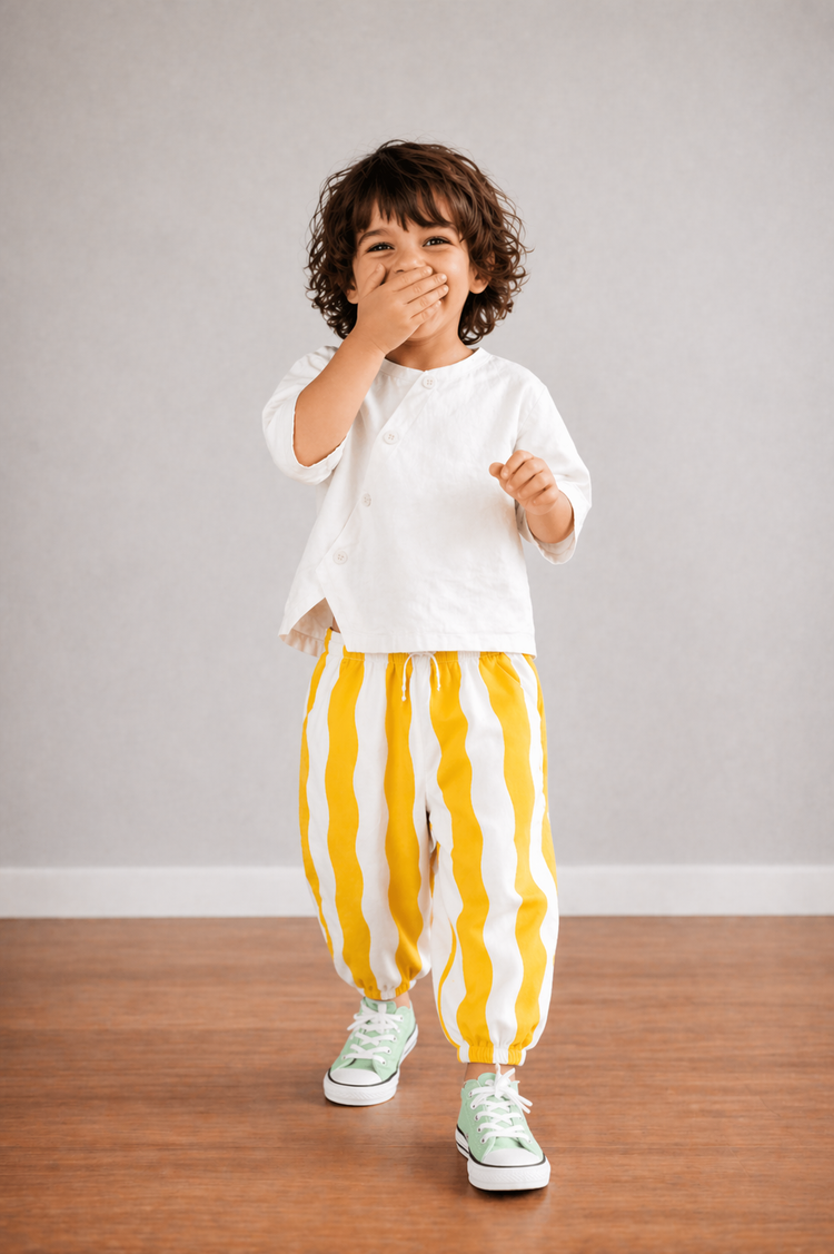 Boy wearing Anaario Sun Stripe Wrap Co-ord Set