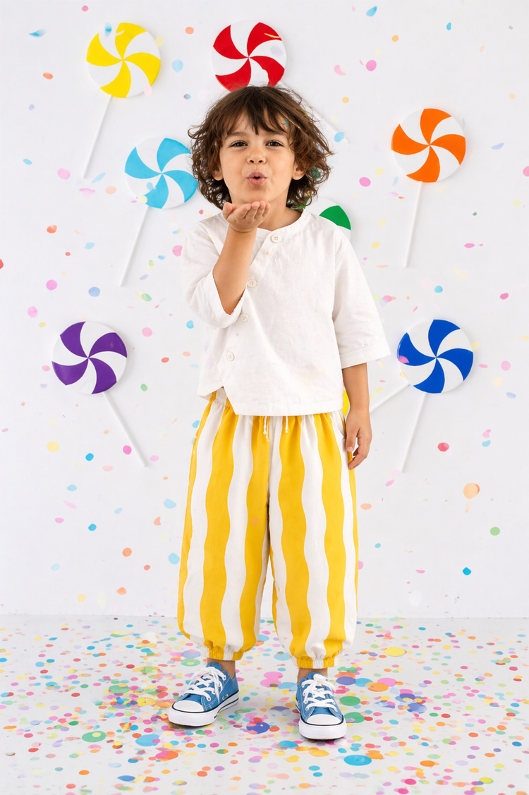 Boy wearing Anaario Sun Stripe Wrap Co-ord Set