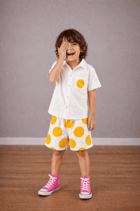 Boy wearing Anaario Sunbeam Dot Pocket Shirt Set