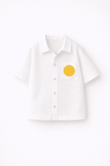 Boy wearing Anaario Sunwave Pocket Shirt Set, white pocket shirt with matching yellow wavy-striped shorts