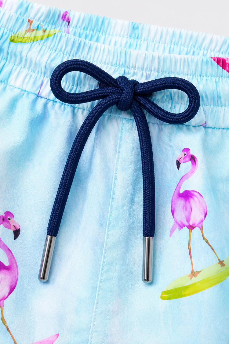 Boy wearing Anaario Surfing Flamingo Shorts