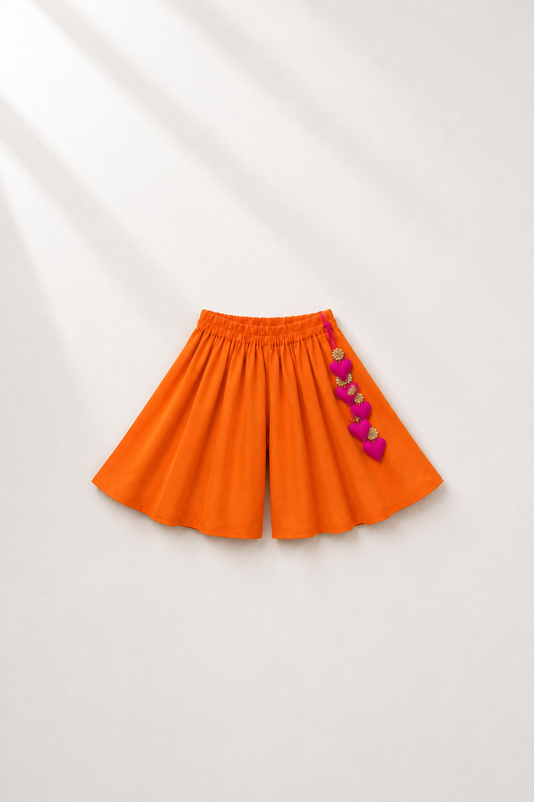 Anaario Teal Orange Peplum Co-ord Set, orange palazzo pants flat lay with heart-charm tassel