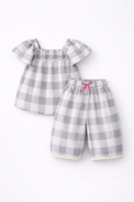 Girl wearing Anaario Cloud-Check Co-ord Set
