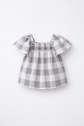 Girl wearing Anaario Cloud-Check Co-ord Set