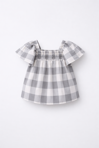 Girl wearing Anaario Cloud-Check Co-ord Set