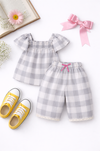 Girl wearing Anaario Cloud-Check Co-ord Set