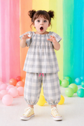Girl wearing Anaario Cloud-Check Co-ord Set