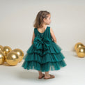 Girl wearing Anaario Emerald Tiered Tiara Dress, emerald green tiered tulle dress with beaded bodice