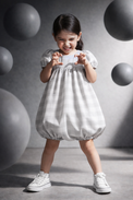 Girl wearing Anaario Gingham Dreams Dress
