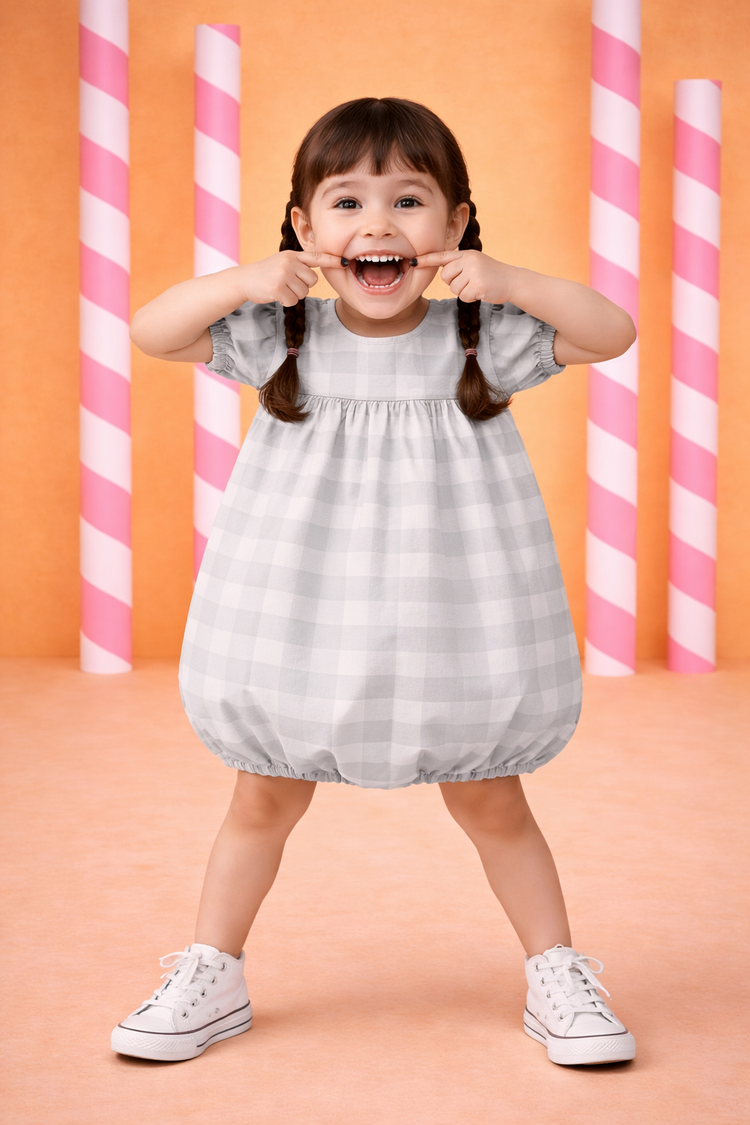 Girl wearing Anaario Gingham Dreams Dress