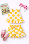 Girl wearing Anaario Marigold Polka Shorts Set
