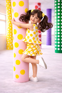 Girl wearing Anaario Marigold Polka Shorts Set