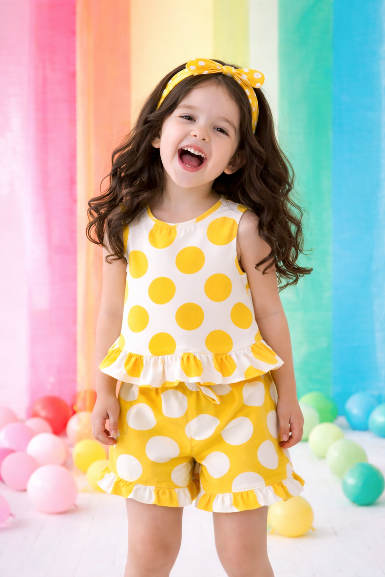 Girl wearing Anaario Marigold Polka Shorts Set