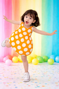 Girl wearing Anaario Orange Creamsicle Dress