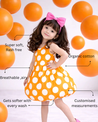 Girl wearing Anaario Orange Creamsicle Dress