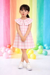 Girl wearing Anaario Peppermint Gingham Dress