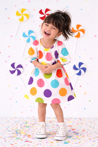 Girl wearing Anaario Rainbow Confetti Dress