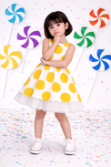 Girl wearing Anaario Sun-Kissed Polka Dress