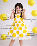 Girl wearing Anaario Sun-Kissed Polka Dress