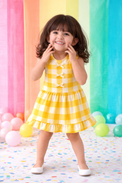 Girl wearing Anaario Sunbeam Gingham Dress