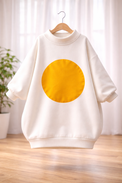 Girl wearing Anaario Sunny Side Up Oversized Pullover, cream oversized sweatshirt with yellow sun print and yellow beret