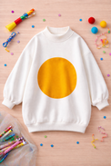 Girl wearing Anaario Sunny Side Up Oversized Pullover, cream oversized sweatshirt with yellow sun print and yellow beret