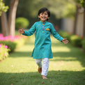 Boy wearing Anaario Turquoise Toy-Pocket Kurta Set, turquoise damask print kurta with car toy-pocket applique