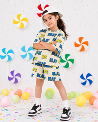 Girl wearing Anaario Twirl-About Shorts Set